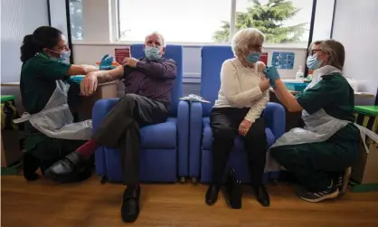  ?? Photograph: Victoria Jones/ PA ?? Patients receive the Pfizer/BioNTech Covid-19 vaccine at Basildon University hospital, Essex, December 2020.