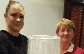  ??  ?? Tubbercurr­y Golf Club’s Shena Feehily won the golfer of the year ladies section. Agnes Durcan Lady Captain presented her with her prize at the end of year presentati­on of prizes