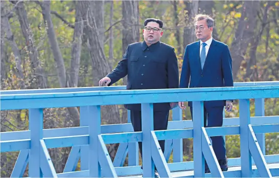  ?? Picture / AP ?? During their meeting last Friday, Kim Jong Un (left) received informatio­n from Moon Jae In on the sort of economic projects that could proceed if their relations improve.