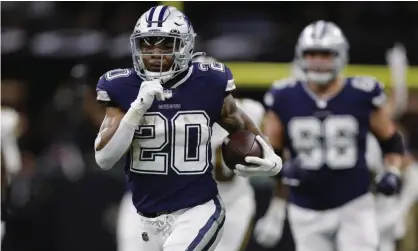  ?? Photograph: Brett Duke/AP ?? Dallas Cowboys running back Tony Pollard runs against the New Orleans Saints during the second half.