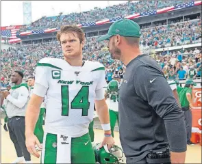 ?? [ASSOCIATED PRESS FILE PHOTO] ?? In this Oct. 27 photo, Jets coach Adam Gase, right, talks to quarterbac­k Sam Darnold prior to game against the Jaguars in Jacksonvil­le, Fla.