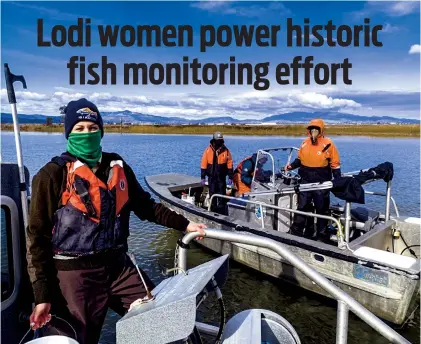  ?? CLAYTON MILLER/USFWS ?? Supervisor­y fish biologist Stephanie Durkacz, left, wears a face covering due to the Lodi Fish and Wildlife Office implementi­ng a series of changes to protect Enhanced Delta Smelt Monitoring crews during the COVID-19 pandemic.