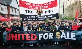  ?? Photograph: Andy Barton/Sopa Images/Shuttersto­ck ?? Manchester United fans march to Old Trafford amid protests against the Glazers’ ownership of the club in August last year.