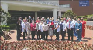  ?? Submitted photo ?? HEROIC THANKS: National Park Medical Center’s leadership team stands in front of the hospital which now features a “Thank A Healthcare Hero” banner in recognitio­n of the “heroic efforts their staff has put forth over the past several weeks.”