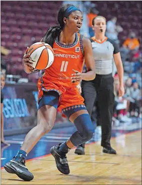  ?? SEAN D. ELLIOT/THE DAY ?? In this May 1 file photo, Connecticu­t Sun guard Nia Clouden plays in a WNBA preseason game against the Atlanta Dream at Mohegan Sun Arena.