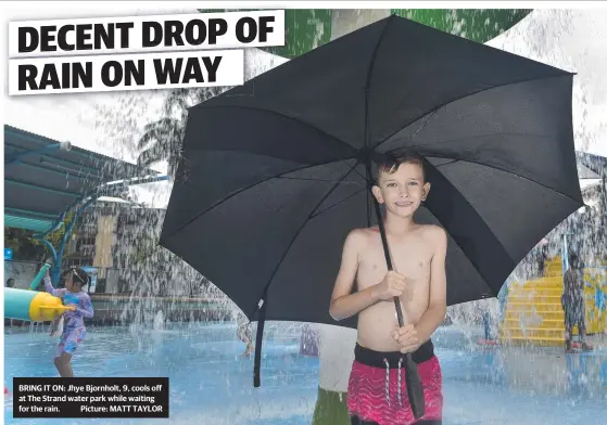  ?? Picture: MATT TAYLOR ?? BRING IT ON: Jhye Bjornholt, 9, cools off at The Strand water park while waiting for the rain.