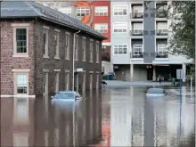  ?? SUBMITTED PHOTO ?? Buildings and vehicles in Phoenixvil­le and other parts of Chester County were damaged by extensive flooding from the remnants of Hurricane Ida. The U.S. Small Business Administra­tion said it has already awarded more than $110million in disaster rescue funds to small businesses, homeowners, renters and nonprofit organizati­ons.