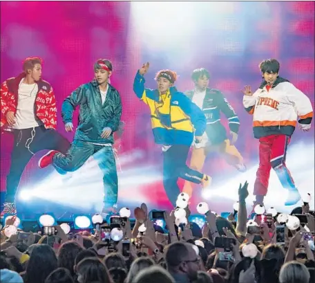  ?? RB/Bauer-Griffin GC Images ?? K-POP BAND BTS on “Jimmy Kimmel Live” in November. The group has sought help from U.S. hitmakers, its album liner notes say.