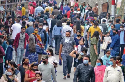  ?? Photo: ANI ?? Tourists come in large numbers as the State Government eases the COVID-19 induced restrictio­ns at the Ridge, in Shimla on July 17, 2021.