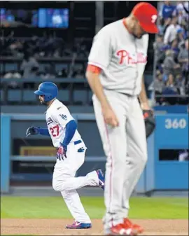  ?? Wally Skalij Los Angeles Times ?? MATT KEMP CIRCLES the bases after hitting a two-run home run against Philadelph­ia’s Zach Ef lin in the third inning, part of Kemp’s four-RBI game.