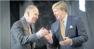  ?? AFP ?? Ian Buruma, left, receives the Erasmus Prize from Dutch Crown Prince Willem-Alexander in Nov 2008. Mr Buruma, the editor of the New York Review of Books, left his position after being criticised for an essay condemned as insulting to victims of sexual abuses.