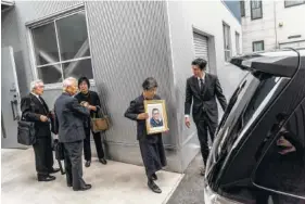  ?? FILE PHOTO BY BEN C. SOLOMON/THE NEW YORK TIMES ?? Relatives of Hajime Iguchi depart Sousou, a so-called corpse hotel, en route to a crematory in Kawasaki City, Japan, on Sept. 12, 2016.