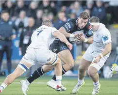  ?? ?? Huw Jones, right, during a Scotland training session at Oriam. He is likely to be partnered in the centre by Cam Redpath, left, against Italy on Saturday. Above, Jones in action for Glasgow Warriors