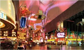  ?? D Hurst/Alamy ?? Conflagrat­ion of signs … the Freemont Street Experience in downtown Las Vegas. Photograph: