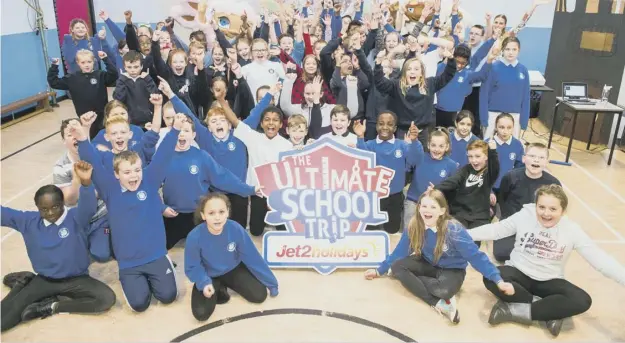  ??  ?? 0 The P7 class at Canal View Primary in Edinburgh celebrate their win of a holiday in Majorca after producing a stop motion film for a Jet2 competitio­n