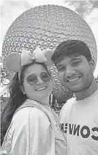  ?? PROVIDED BY BELLA RODRIGUEZ ?? Bella Rodriguez and her boyfriend Emilio Lopez smile near EPCOT’s iconic Spaceship Earth.