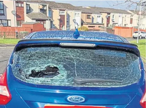  ??  ?? WILFUL DAMAGE: A car with its rear window smashed – just one of many incidents in the Rosyth area in recent weeks.