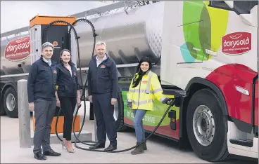  ?? ?? Melissa Butler, Dairygold HGV driver, charging ‘e-moove’, Dairygold’s new electric milk truck at the Dairygold Castlefarm Dairy Processing Complex in Mitchelsto­wn, in the presence of Michael Harte, Dairygold interim chief executive; Orlaith Tynan, Dairygold head of sustainabi­lity and Billy Cronin, Dairygold head of supply chain.