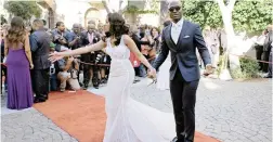  ?? PICTURE: IAN LANDSBERG ?? GLITZ AND GLAMOUR: Home Affairs Minister Malusi Gigaba and his wife, Nomachule Mngoma, on the red carpet outside Parliament yesterday.