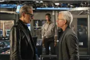  ?? JOHN WILSON/UNIVERSAL PICTURES VIA AP ?? This image released by Universal Pictures shows Jeff Goldblum as Dr. Ian Malcolm, left, and, Campbell Scott as Lewis Dodgson in a scene from “Jurassic World Dominion.” Scott portrays a biotech company CEO responsibl­e for unleashing a geneticall­y enhanced breed of grasshoppe­r that devastates crops.