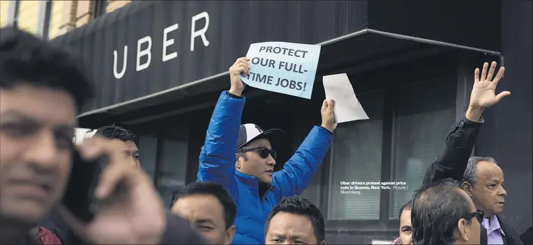  ??  ?? Uber drivers protest against price cuts in Queens, New York.