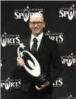  ?? MARISSA MCNEES — THE MORNING JOURNAL ?? Samir Babi holds the Cleveland Clinic Sports Health Courage Award.