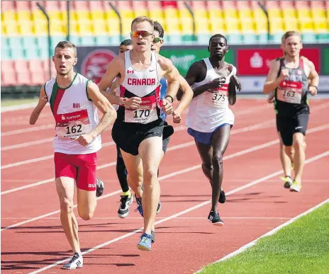  ?? RALF KUCKUCK/THE CANADIAN PRESS ?? Nathan Riech of Canada, second, who suffered a severe brain injury after being hit by a golf ball at the age of 10, has turned heads on the Paralympic track, setting two world records at the world Paralympic Athletes Grand Prix last week in Berlin.