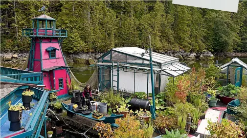  ??  ?? From the mini lighthouse to the dance platform and candle workshop, Wayne and Catherine’s floating home is a heady mix of wonder and practicali­ty