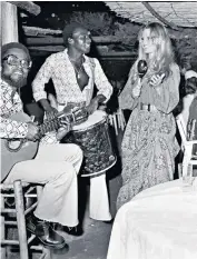  ??  ?? Brigitte Bardot plays a maraca in St Tropez during its 1960s heyday