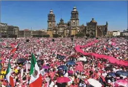  ?? Fernando Llano Associated Press ?? IN MEXICO CITY, many at Sunday’s demonstrat­ion wore white and pink, the color of the National Electoral Institute, and shouted, “Don’t touch my vote!”