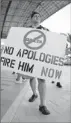  ?? By Mike Ehrmann, Getty Images ?? Tuesday: A protester rallies in Miami.