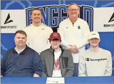  ?? Scott Herpst ?? Ringgold senior safety J.B. Lane was joined by Keith and Jaxson Lane as he recently signed on to play football at Maryville (Tenn.) College. Among those on hand for the ceremony was Ringgold assistant coach Austin Crisp and Ringgold head coach Robert Akins.