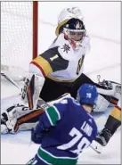  ?? The Canadian Press ?? Vegas Golden Knights’ goalie Dylan Ferguson stops Vancouver Canucks’ forward Kole Lind during third-period preseason NHL play in Vancouver on Sunday.