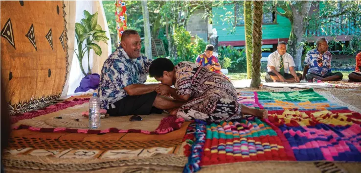  ?? Photo: Leon Lord ?? A Namosi woman shows respect to her paramount chief Ratu Suliano Matanitobu­a as the province welcomed him home at Veivatuloa Village on April 14, 2024.