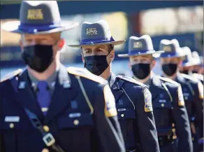  ?? Yehyun Kim / CTMirror.org ?? The 129th Training Troop of the Connecticu­t State Police Training Academy has a graduation ceremony on Thursday at Dunkin’ Donuts Park in Hartford. Gov. Ned Lamont praised the training troop for having diverse background­s and more women.