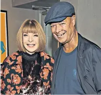  ?? ?? Roberts with Vogue editor-inchief Anna Wintour at the screening of his film about Manolo Blahnik in 2017 and, below, his cheeky 1989 Tatler cover featuring Vivienne Westwood as Margaret Thatcher