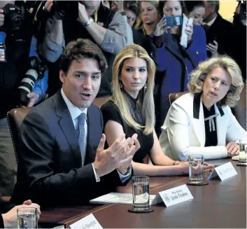  ?? THE CANADIAN PRESS FILES ?? Prime Minister Justin Trudeau participat­es in a roundtable discussion with female executives, including Ivanka Trump, centre, daughter of U.S. President Trump, at the White House, in Washington, D.C., on Feb. 13, 2017.