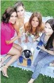  ??  ?? Blanca Blandon, Rebecca Traub, Sabrina Jensen and Serena Gerber Matter enjoy cocktails and hamper fare on a Grey Goose picnic blanket.