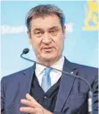  ?? FOTOS: DPA ?? Während Bundeswirt­schaftsmin­ister Robert Habeck notfalls auf eine längere Laufzeit für Kohlekraft­werke setzt, plädiert Bayerns Ministerpr­äsident Markus Söder eher für die Kernenergi­e.