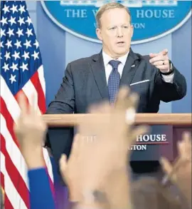  ?? Andrew Harnik Associated Press ?? AFTER President Trump’s apparently erroneous tweet, spokesman Sean Spicer said: “The president and a small group of people know exactly what he meant.”