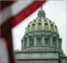  ?? MATT ROURKE — THE ASSOCIATED PRESS ?? This file photo shows Harrisburg. the Pennsylvan­ia Capitol building in