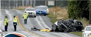  ??  ?? Police at the scene of the fatal crash yesterday on SH1 north of Glenavy.