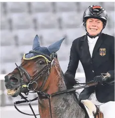  ?? FOTO: MARIJAN MURAT/DPA ?? Die deutsche Athletin Annika Schleu wurde bei den Olympische­n Spielen im Modernen Fünfkampf disqualifi­ziert.