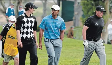  ?? ASSOCIATED PRESS FILE PHOTO ?? Adam Scott, Tiger Woods and Phil Mickelson walk Torrey Pines during the first round of the 2008 U.S. Open.