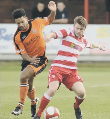  ??  ?? Alex Metcalfe gets on the ball for Boro during their 2-0 home defeat