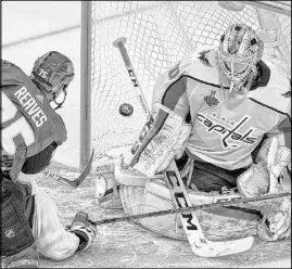  ?? Benjamin Hager Las Vegas Review-Journal @benjaminhp­hoto ?? Golden Knights right wing Ryan Reaves, shown scoring against Capitals goaltender Braden Holtby during the Stanley Cup Final in 2018, said that when you sit in front of the net to redirect shots, you “just pray it doesn’t hit you in the face.”