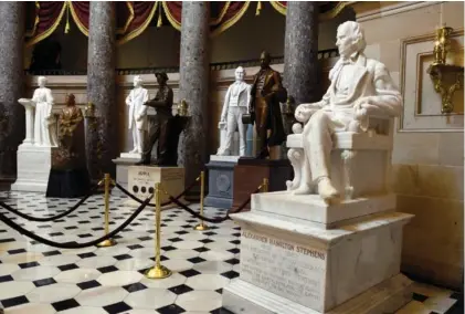  ?? AP PHOTO/SUSAN WALSH ?? A statue of Alexander Hamilton Stephens, Confederat­e vice president throughout the Civil War, is on display in Statuary Hall on Capitol Hill in Washington. U.S. Rep. Tom Graves supports replacing Stephens with a statue of Rep. John Lewis.