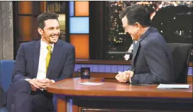  ?? Scott Kowalchyk / Associated Press ?? James Franco, left, appears with host Stephen Colbert on “The Late Show with Stephen Colbert” Tuesday.