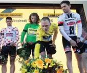  ??  ?? A STAGE WITH TWO SIDES: Tom Dumoulin lays flowers for the victims of the latest terrorist attack in France.