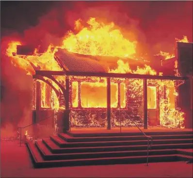  ?? PICTURE: JOSH EDELSON /AFP/GETTY IMAGES ?? ABLAZE: The Soda Rock Winery burns as flames race through Healdsburg, California.